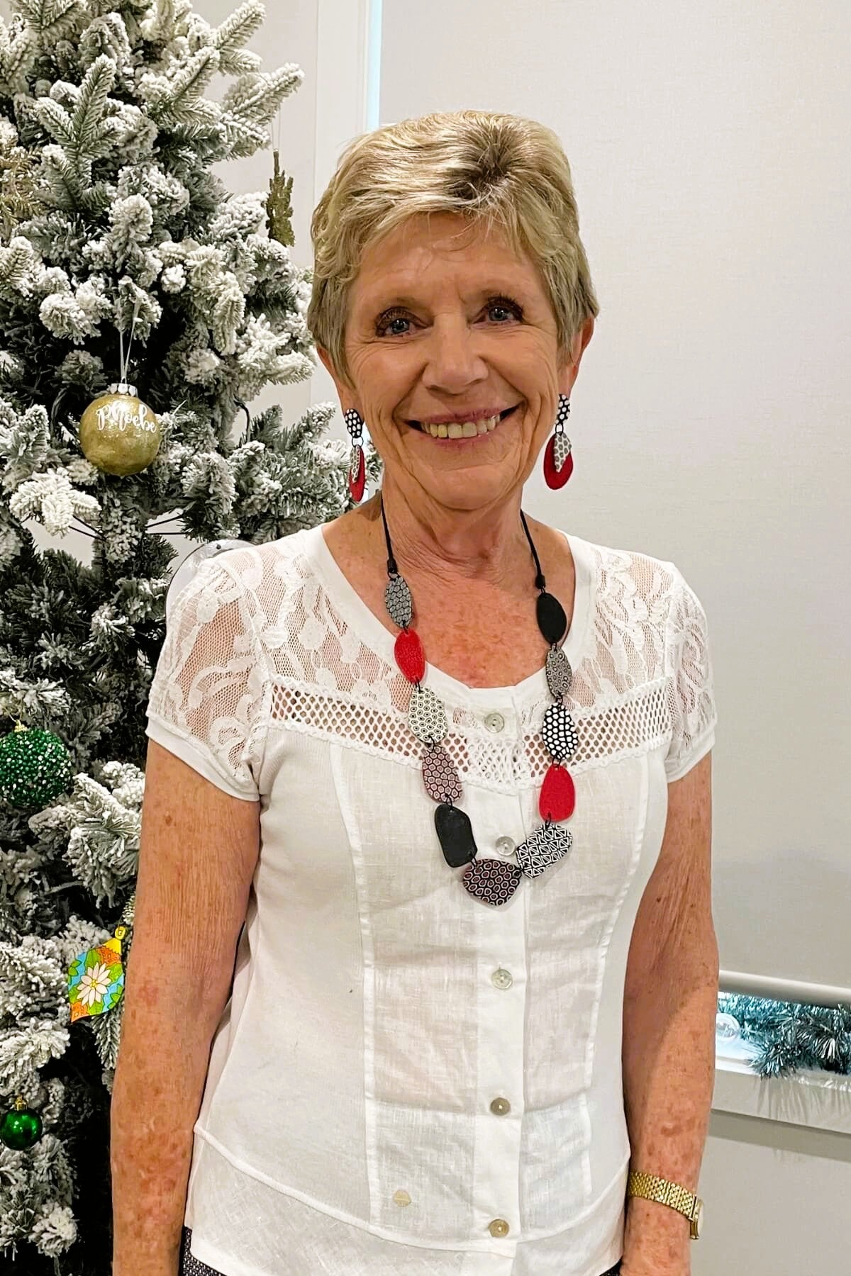 Surya Samunnat Polymer Clay Disc Necklace - on location in Huskisson