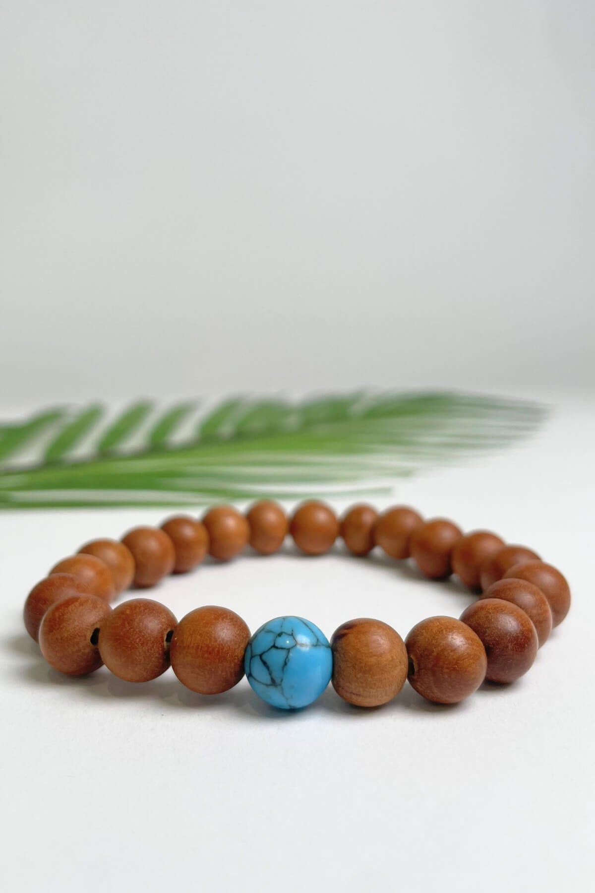 Sandalwood bracelets ethically made in Nepal - blue colour stone