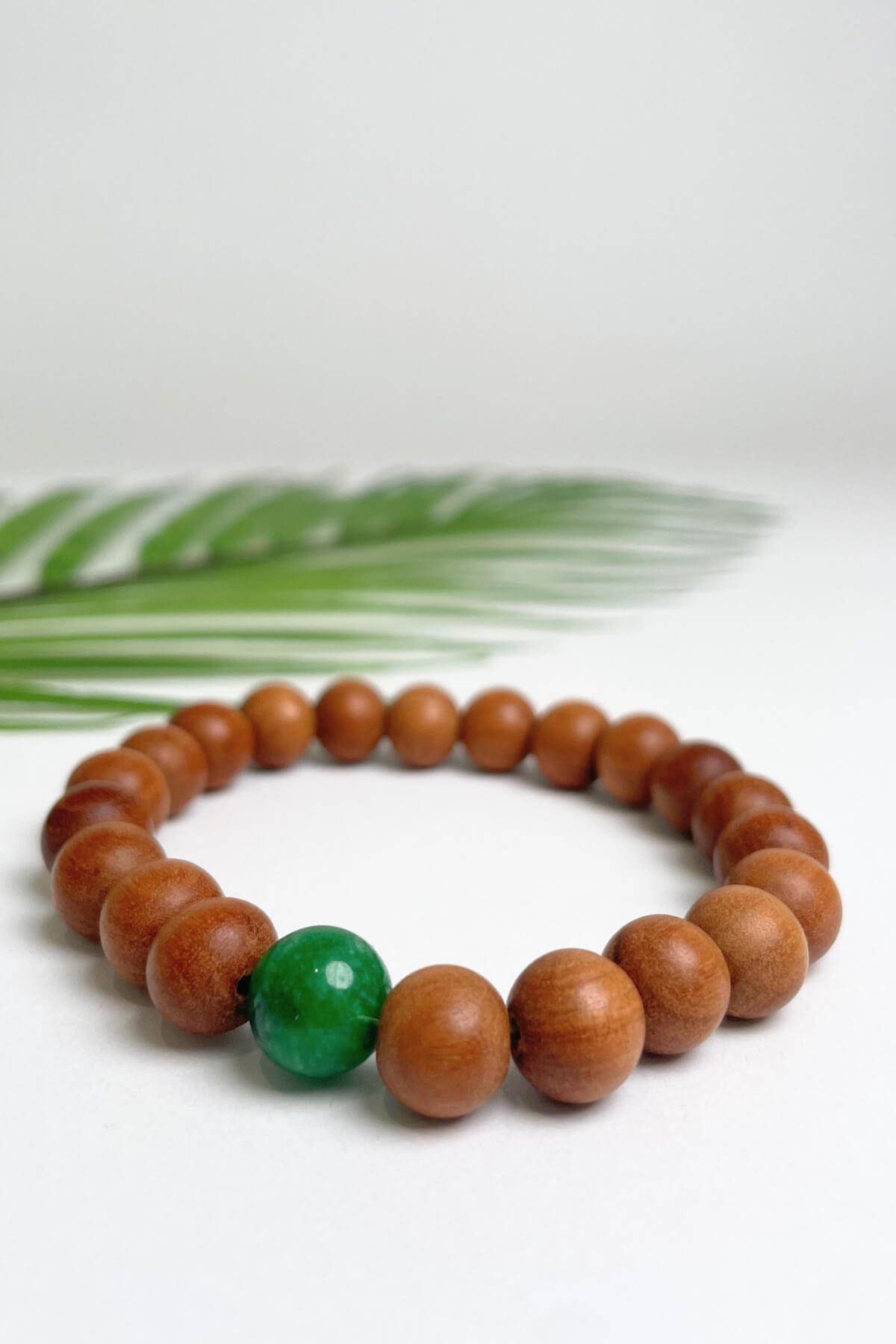 Sandalwood bracelets ethically made in Nepal - green colour stone