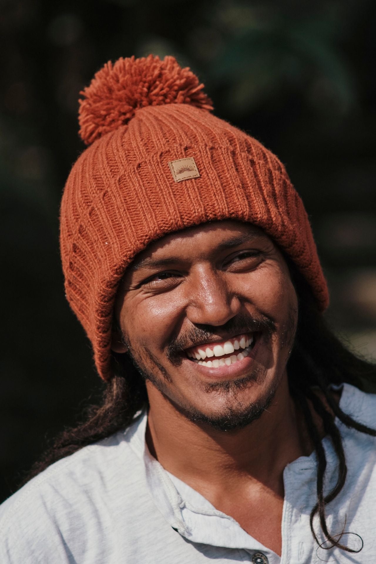 Surya Australia Ethical Wool Pompom Beanie for Men from Nepal - Burnt Orange