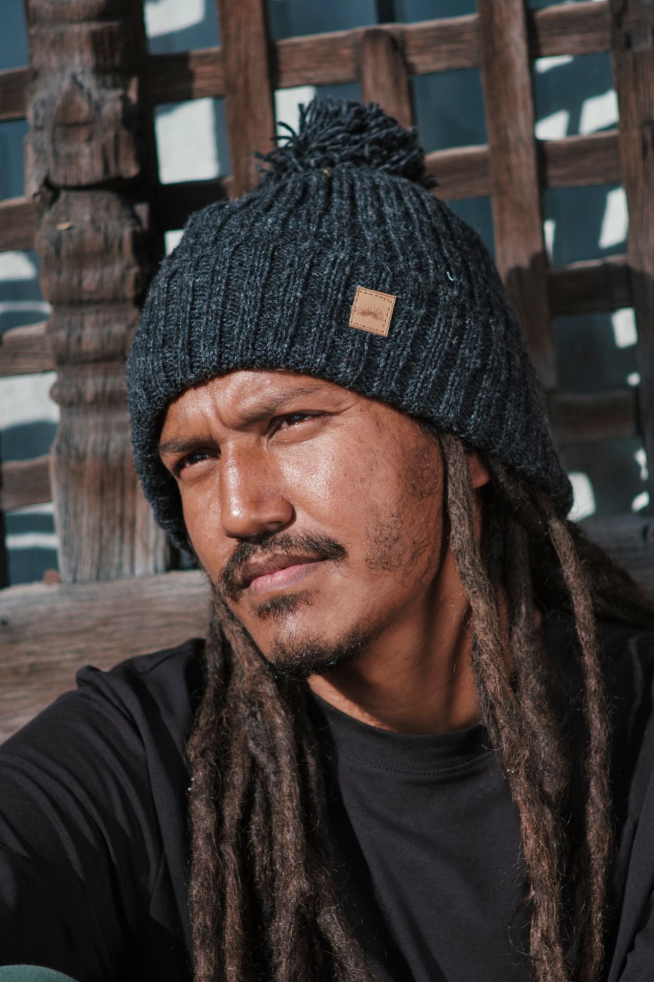 Surya Australia Ethical Wool Pompom Beanie for Men from Nepal - Charcoal