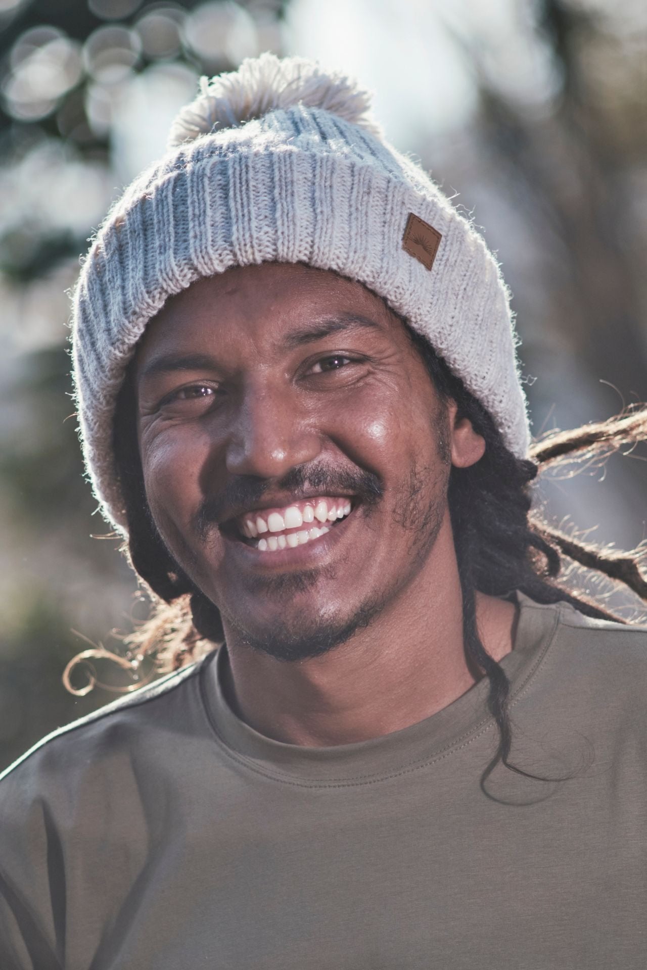 Surya Australia Ethical Wool Pompom Beanie for Men from Nepal - Oatmeal