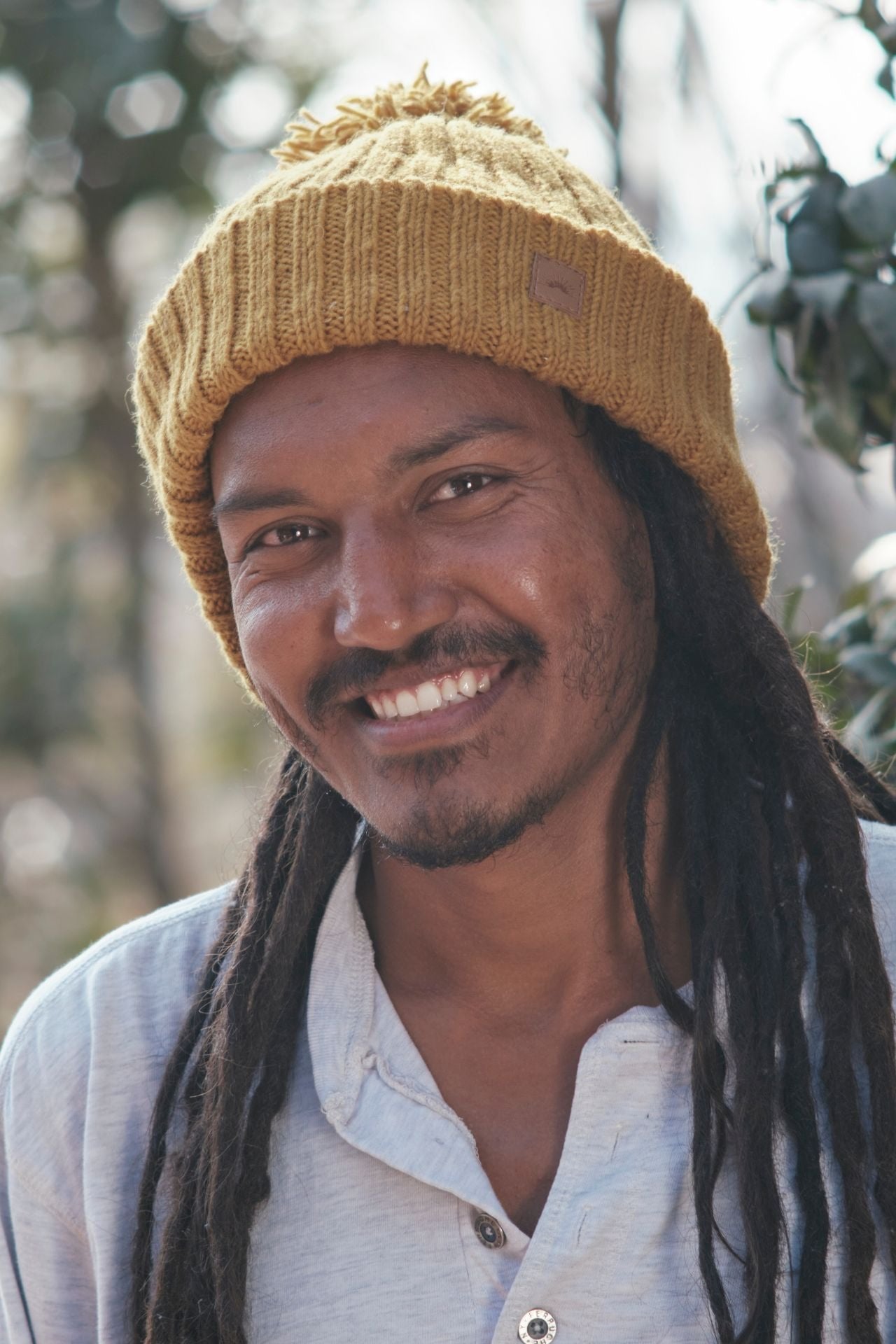 Surya Australia Ethical Wool Pompom Beanie for Men from Nepal - Mustard