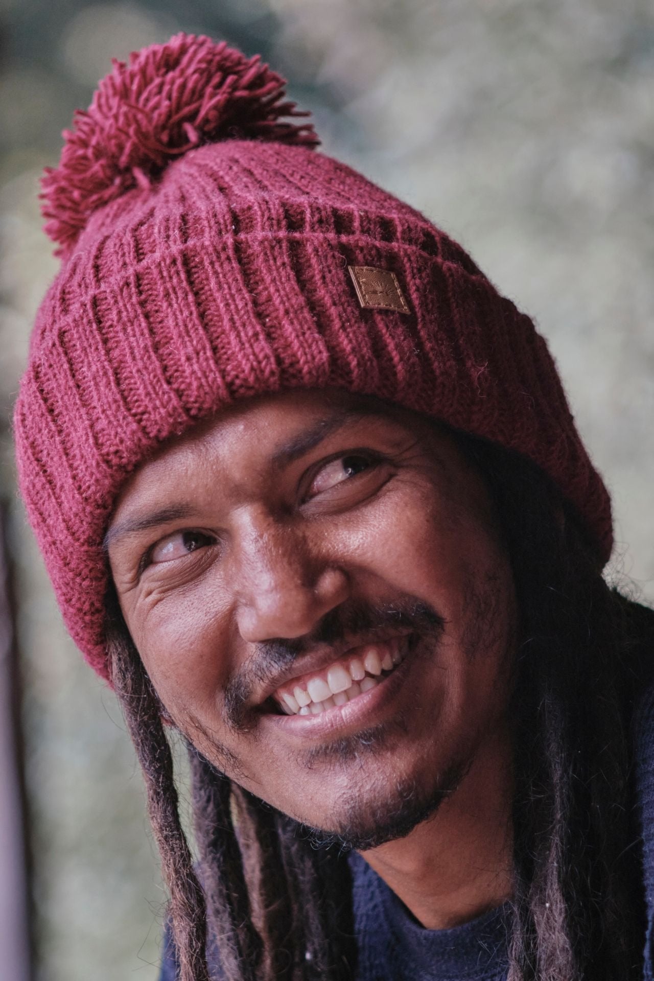 Surya Australia Ethical Wool Pompom Beanie for Men from Nepal - Maroon