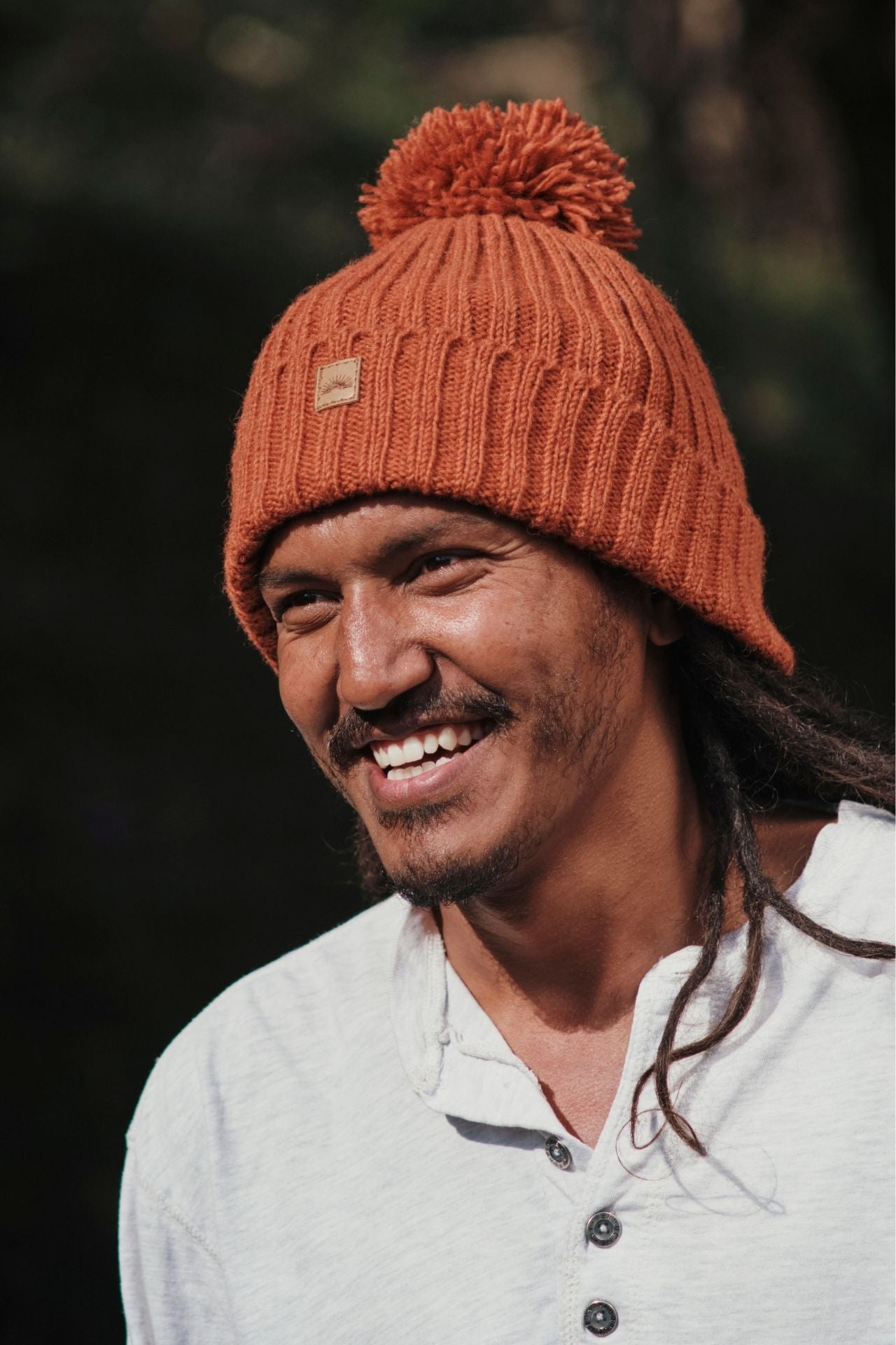 Surya Australia Ethical Wool Pompom Beanie for Men from Nepal - Burnt Orange