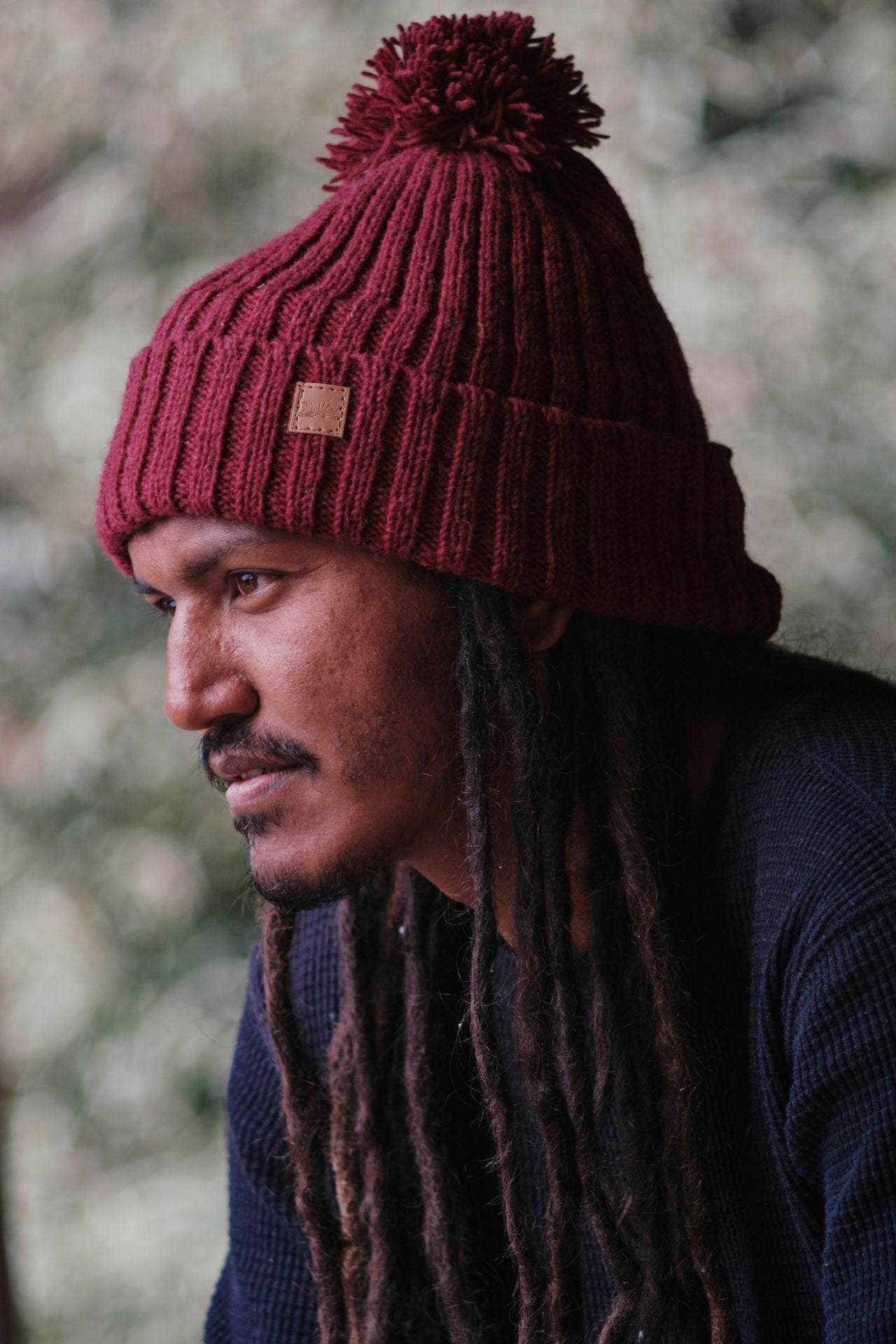 Surya Australia Ethical Wool Pompom Beanie for Men from Nepal - Maroon