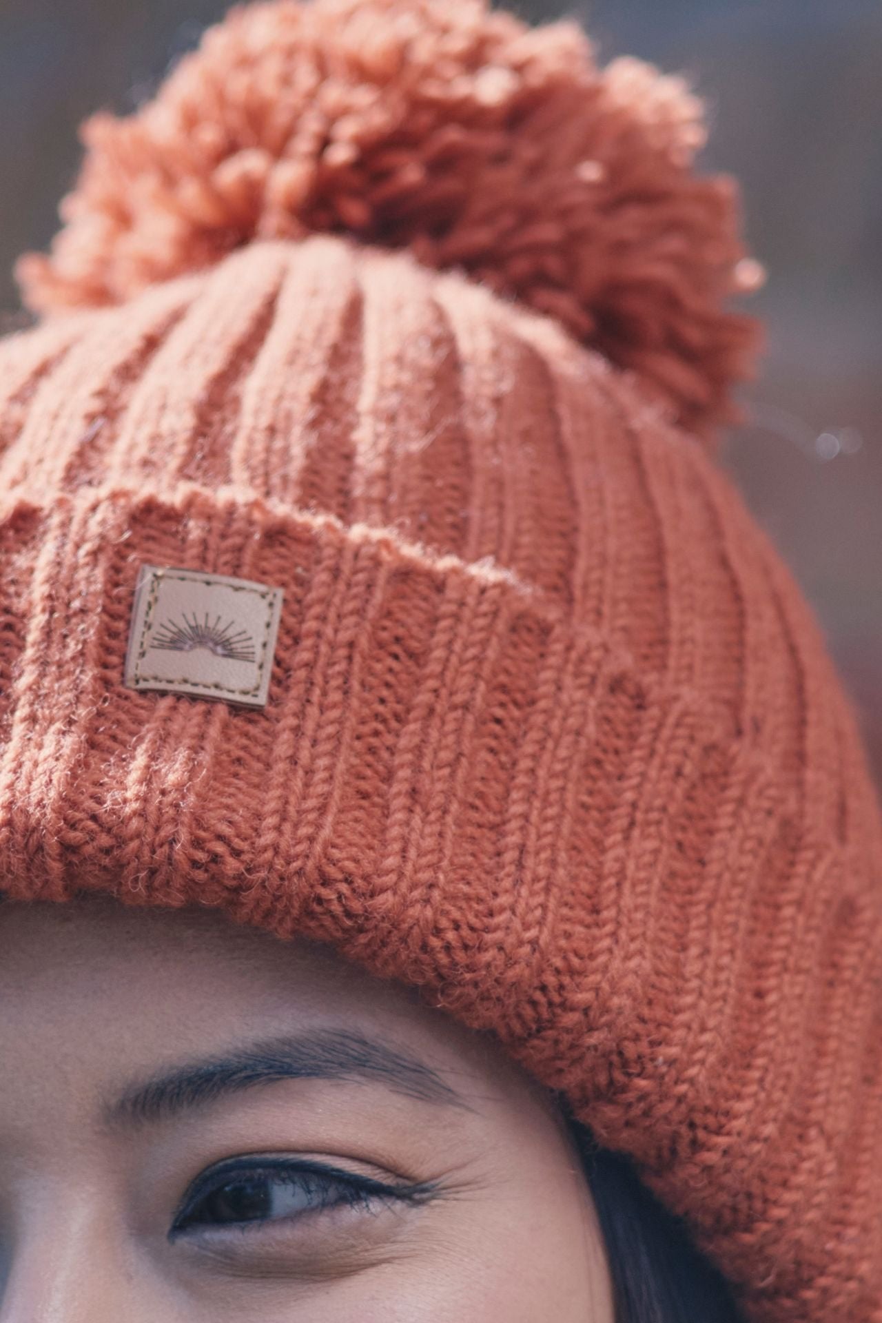 Surya Australia Wool 'Pompom' Beanie for women made in Nepal - Burnt Orange