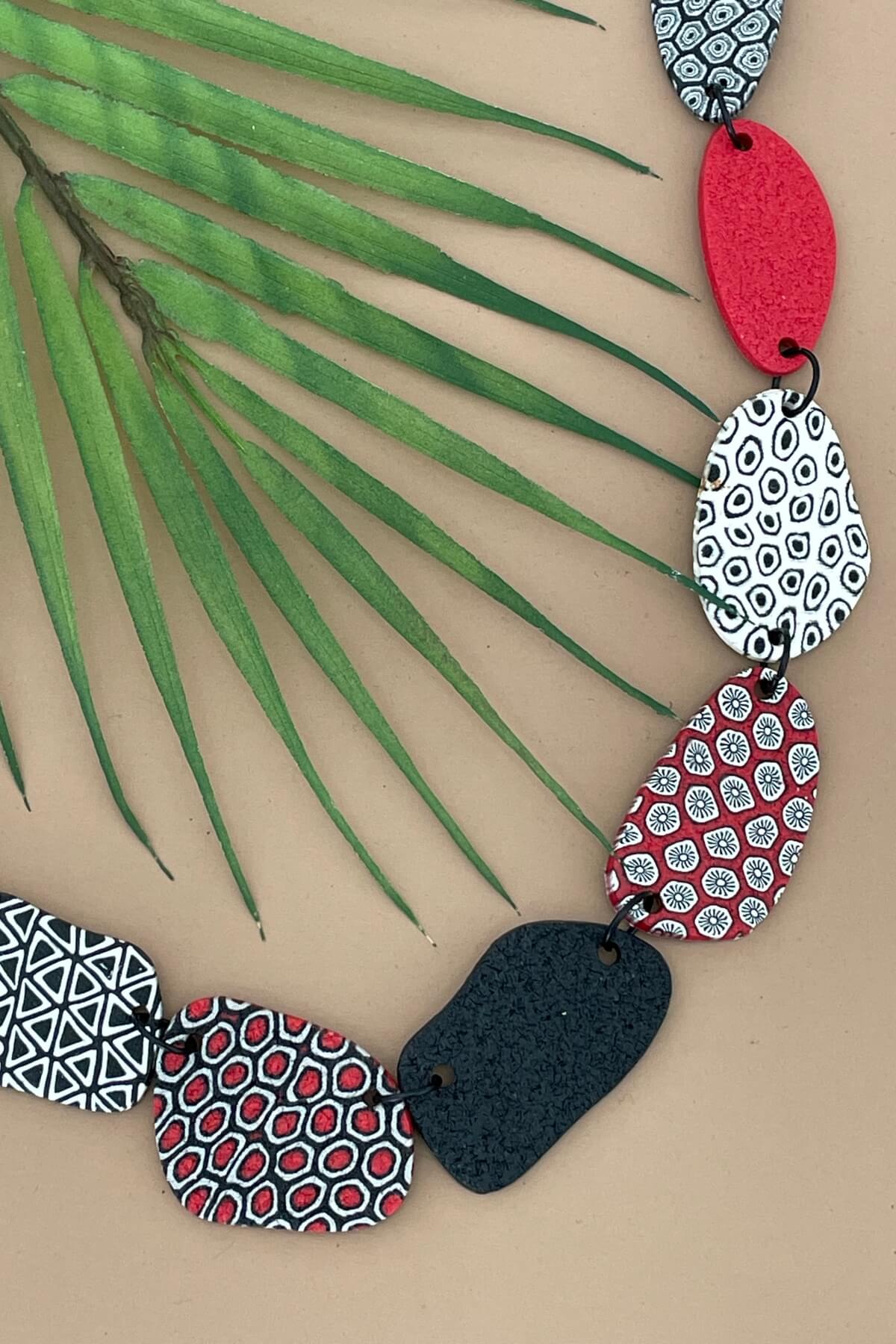 Surya Polymer Clay Disc Necklace - ethically made in Nepal by survivors of domestic violence