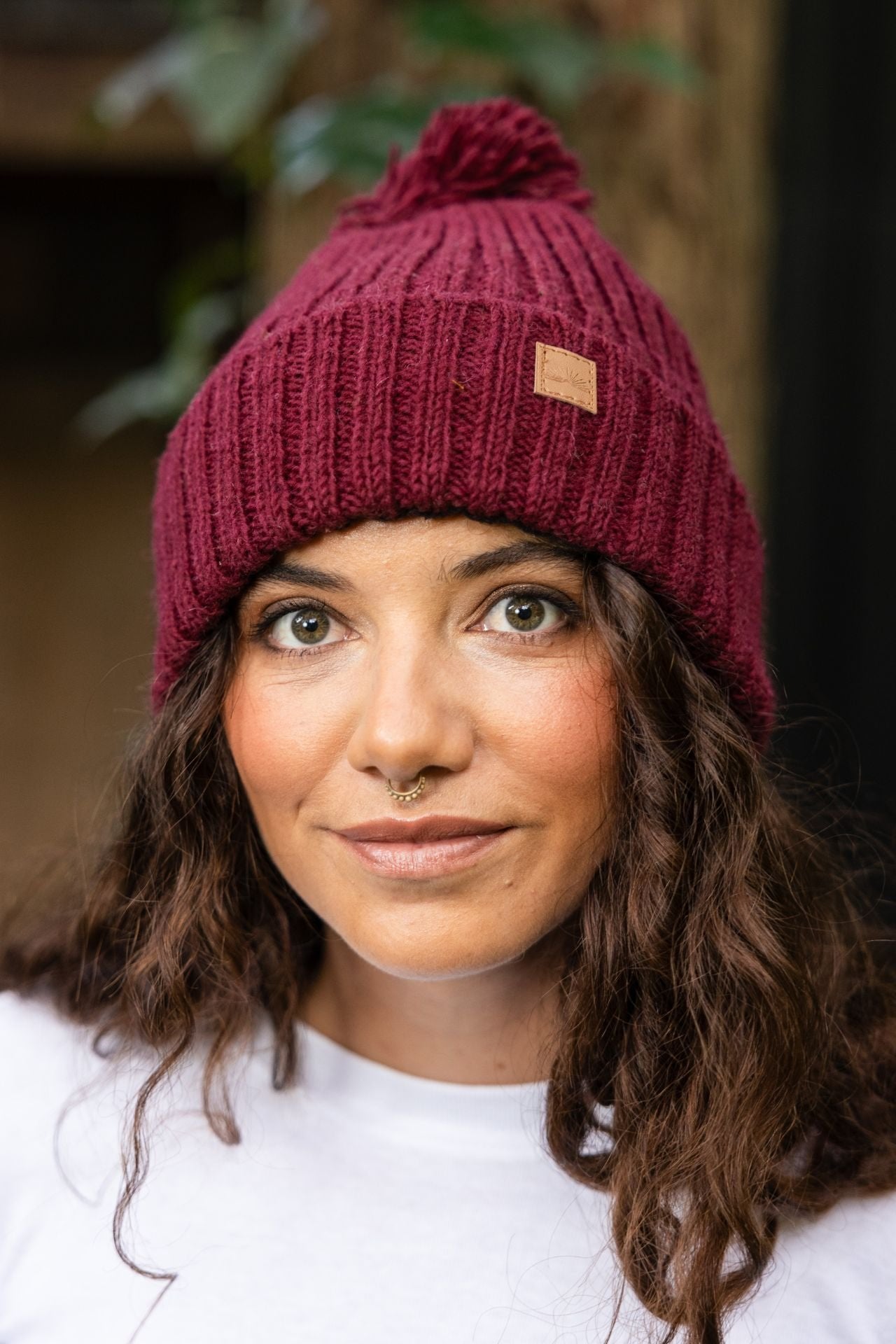 Surya Australia Wool 'Pompom' Beanie for women made in Nepal - Maroon