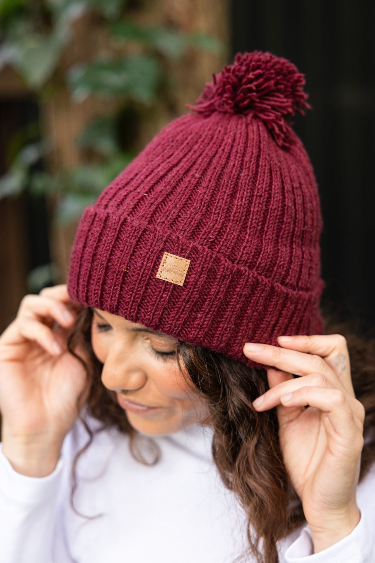 Surya Australia Wool 'Pompom' Beanie for women made in Nepal - Maroon