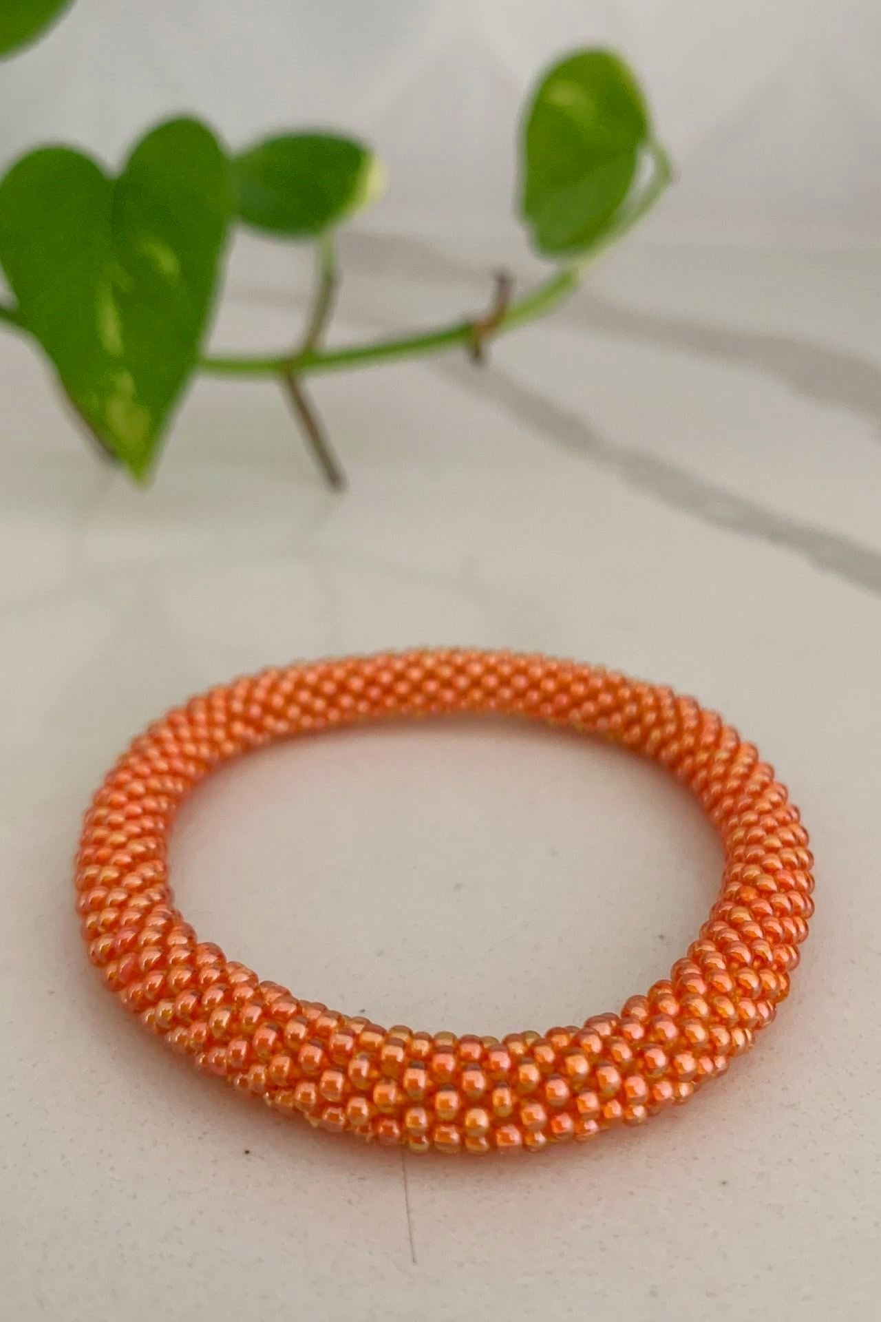 Surya Australia Ethical Roll-on Beaded Bracelet from Nepal - Orange