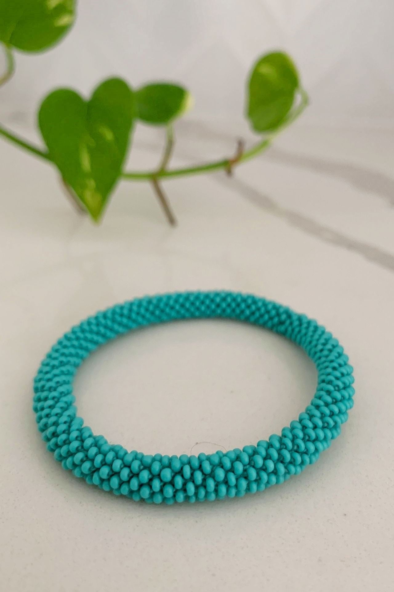 Surya Australia Ethical Roll-on Beaded Bracelet from Nepal - Aqua