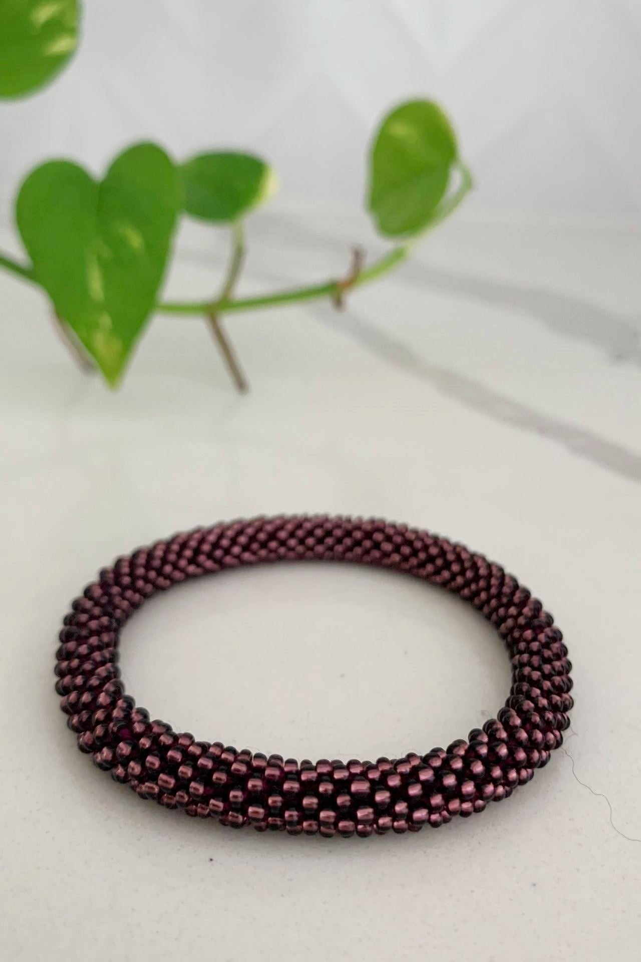 Surya Australia Ethical Roll-on Beaded Bracelet from Nepal - Maroon