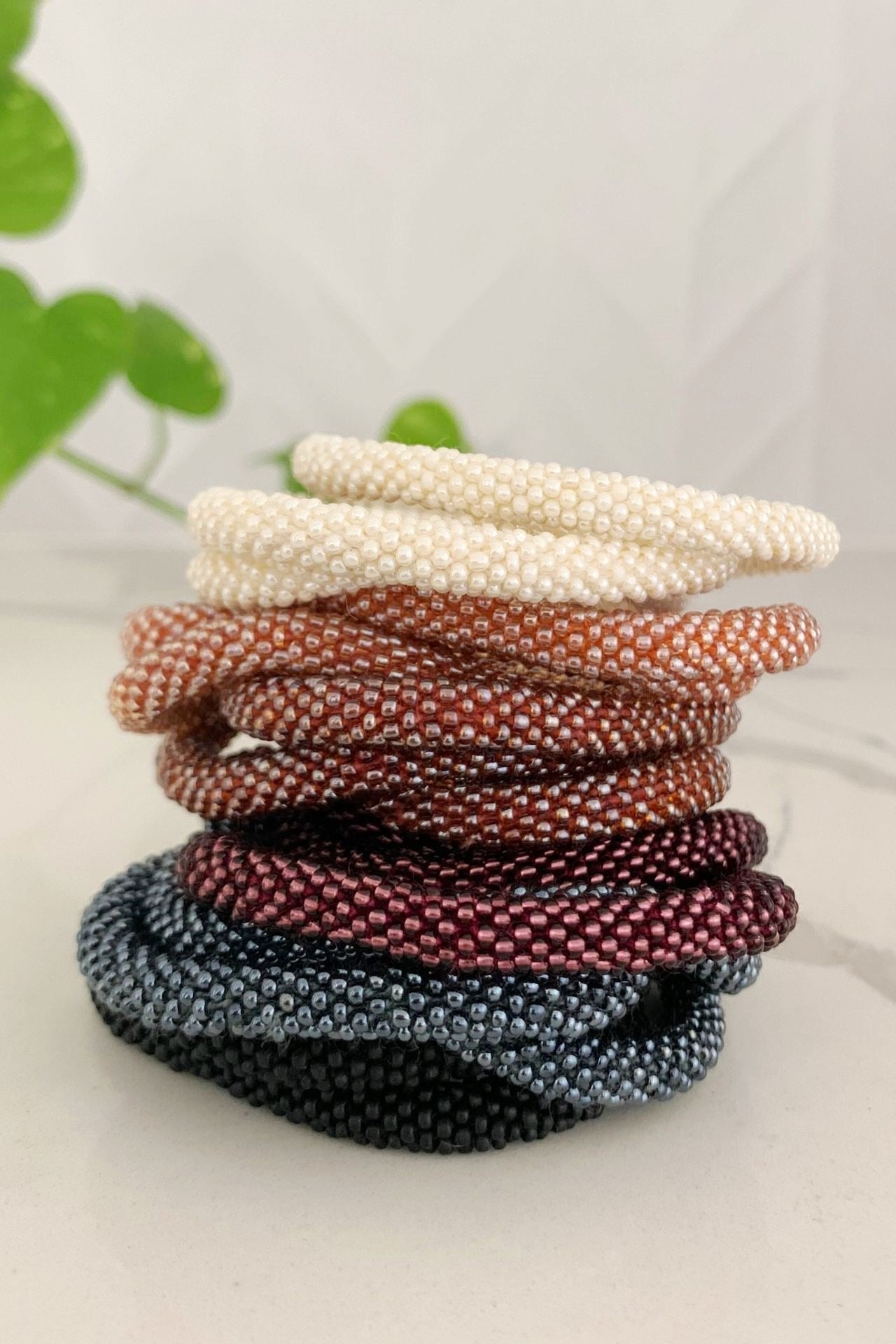 Surya Australia Roll-on glass bead bracelets from Nepal