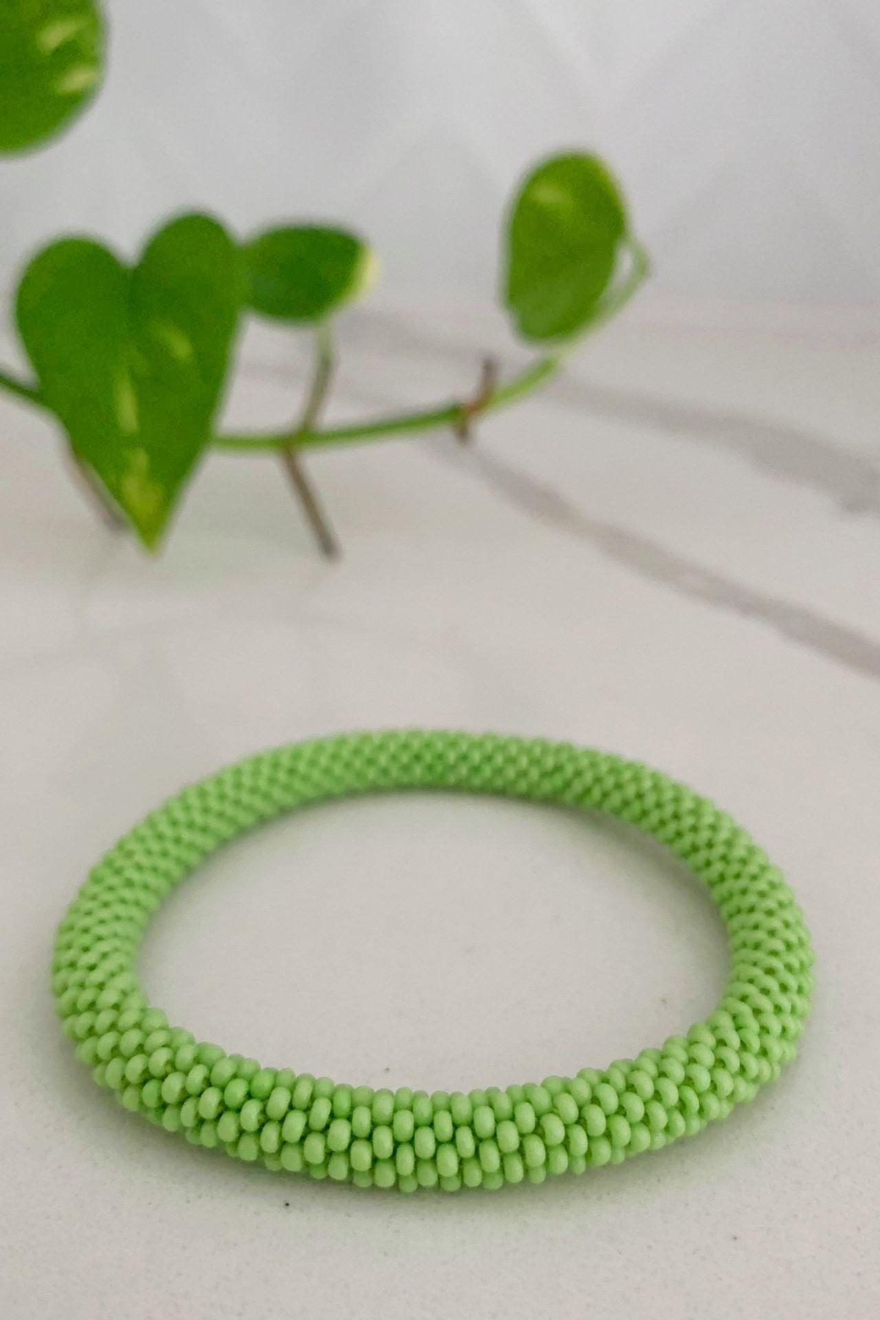 Surya Australia Ethical Roll-on Beaded Bracelet from Nepal - Lime Green