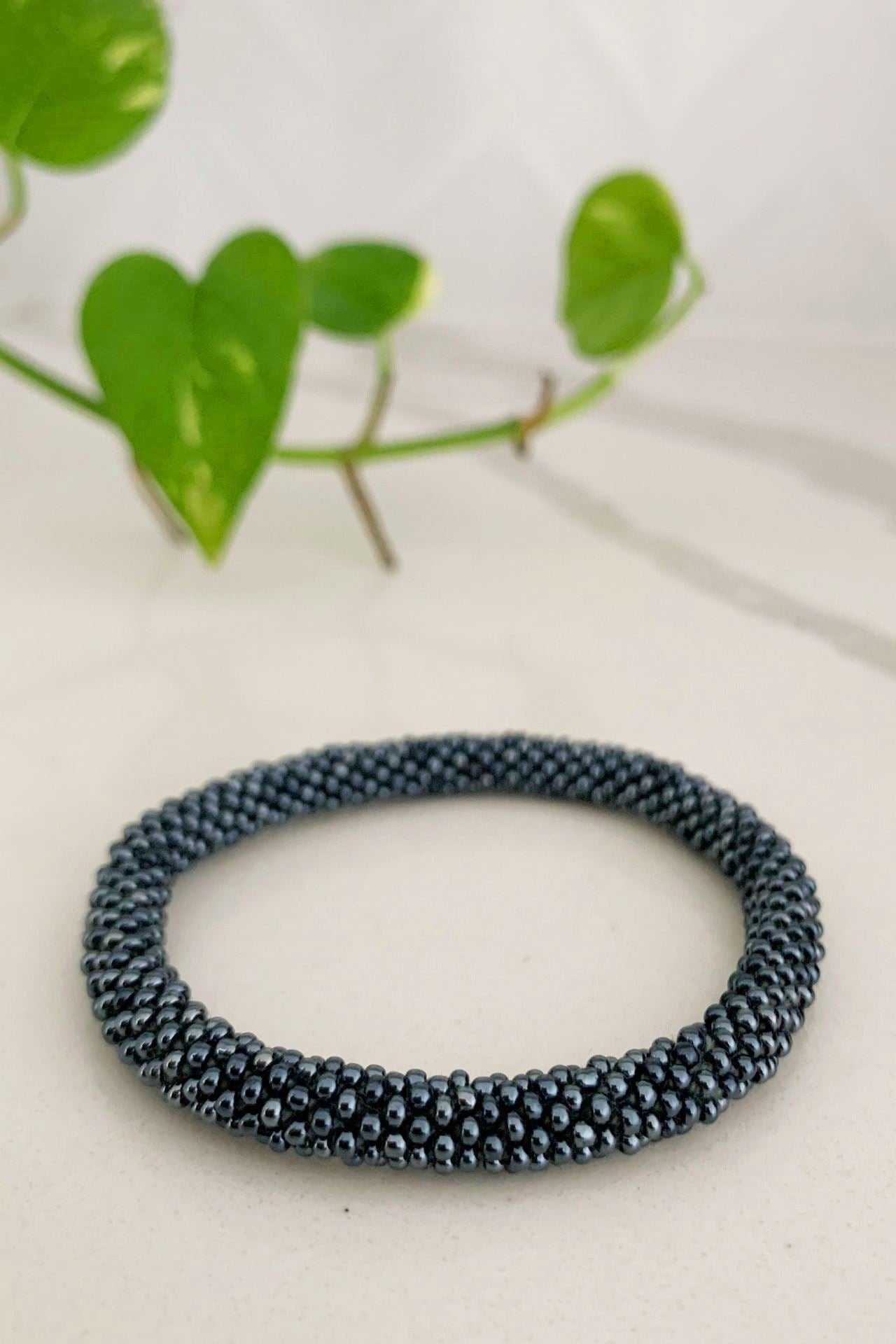 Surya Australia Ethical Roll-on Beaded Bracelet from Nepal - Steel Grey