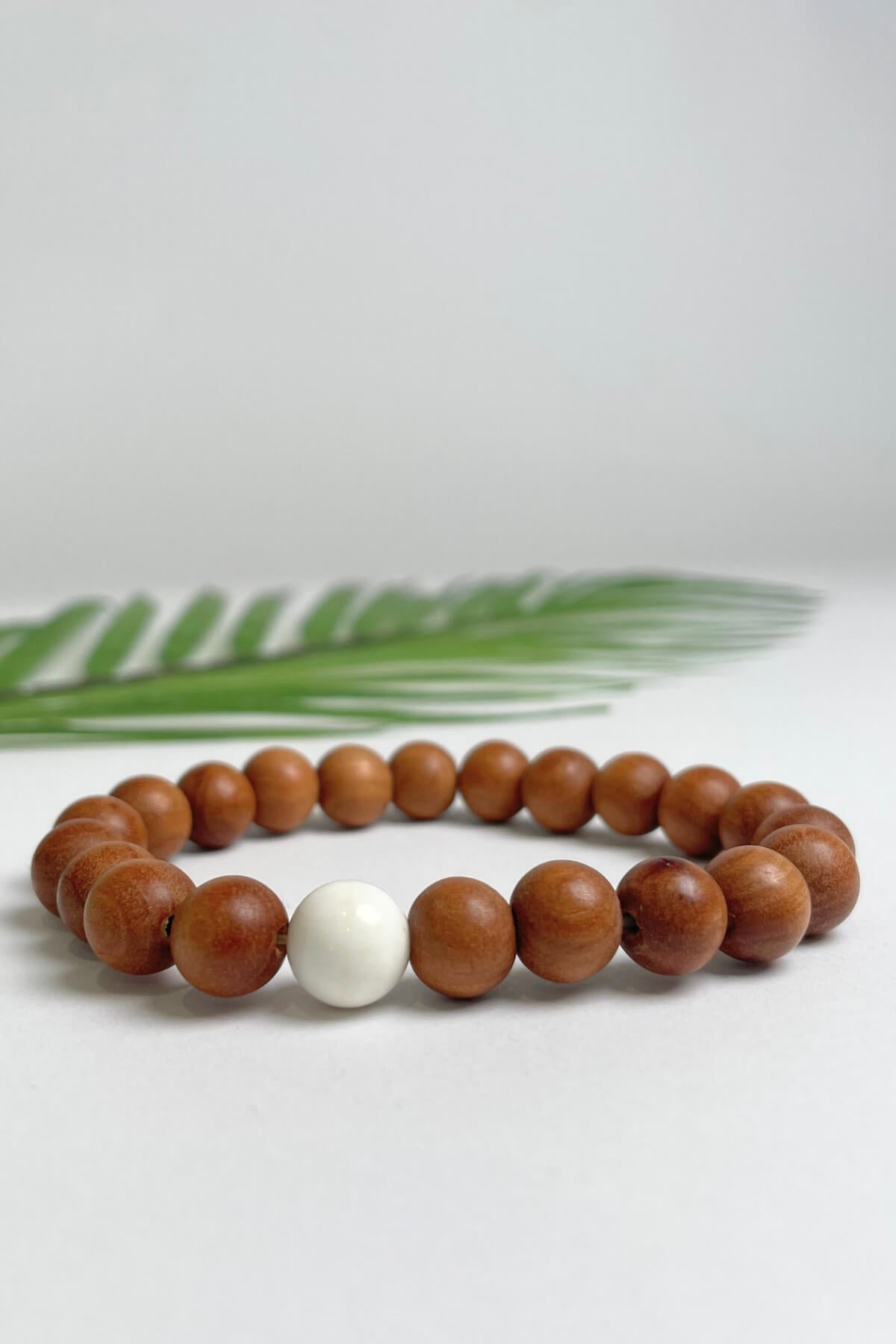 Sandalwood bracelets ethically made in Nepal - white colour stone