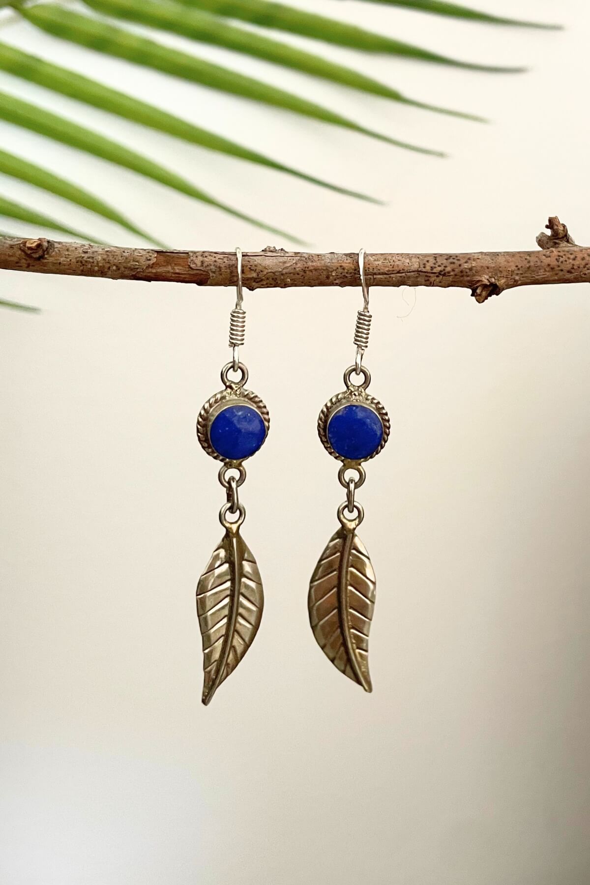 Surya Tibetan style earrings made in Nepal - dark blue stone