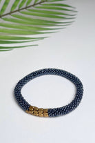 Ethical roll-on beaded bracelets made in Nepal – steel blue