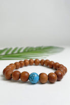 Sandalwood bracelets ethically made in Nepal - blue colour stone