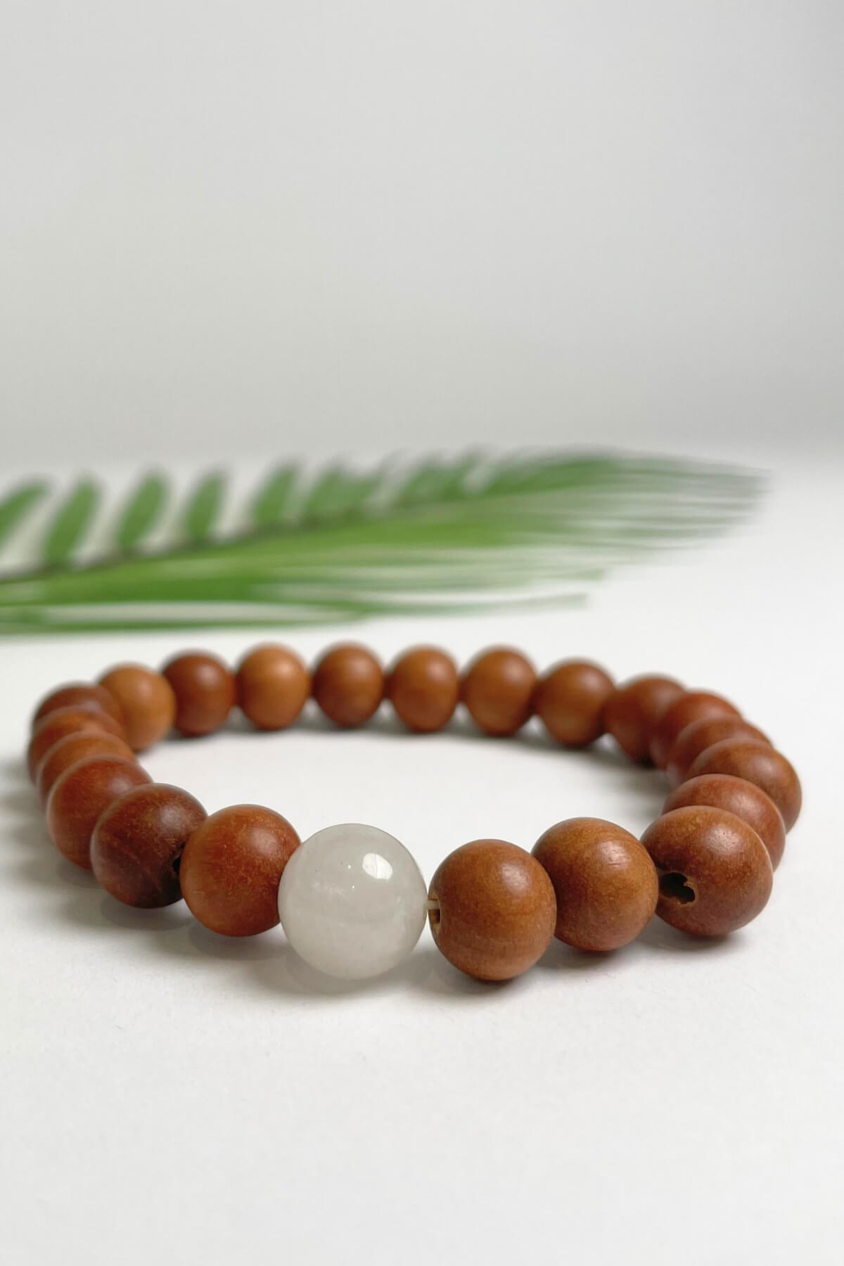 Sandalwood bracelets ethically made in Nepal - opaque white colour stone