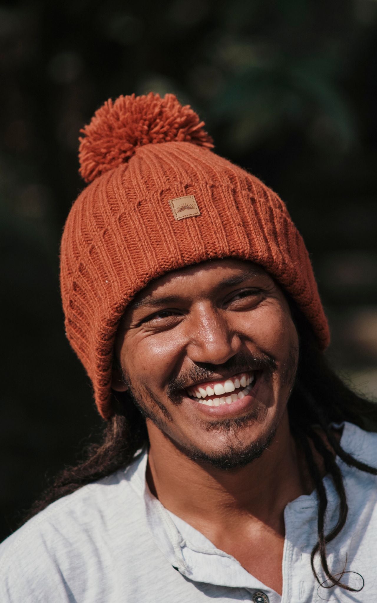 Surya Australia Ethical Wool Pompom Beanie for Men from Nepal - Burnt Orange