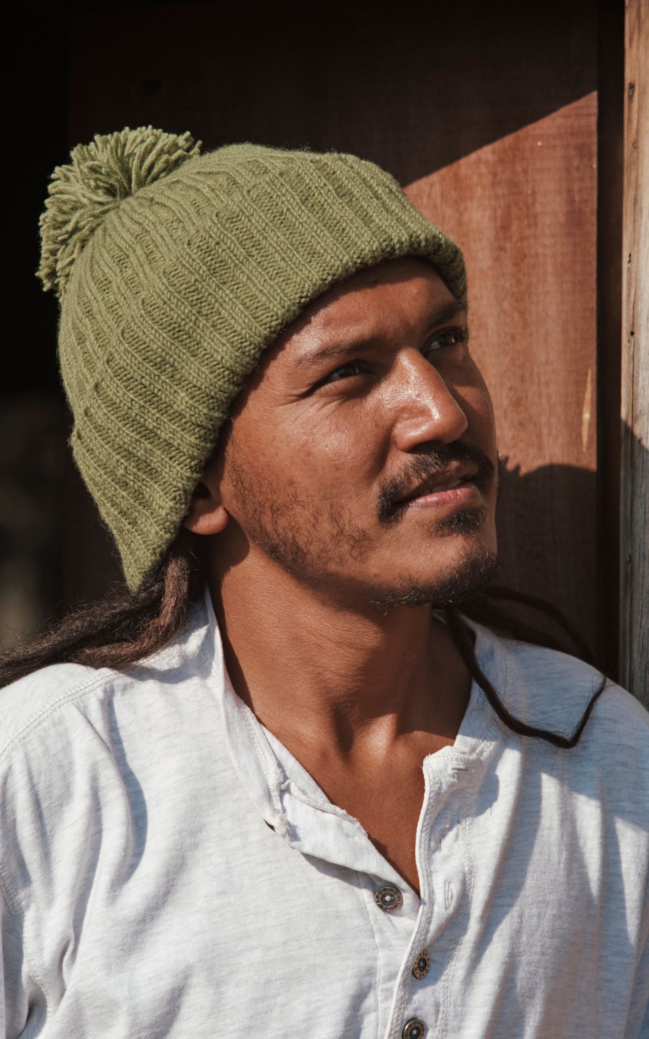 Surya Australia Ethical Wool Pompom Beanie for Men from Nepal - Army Green