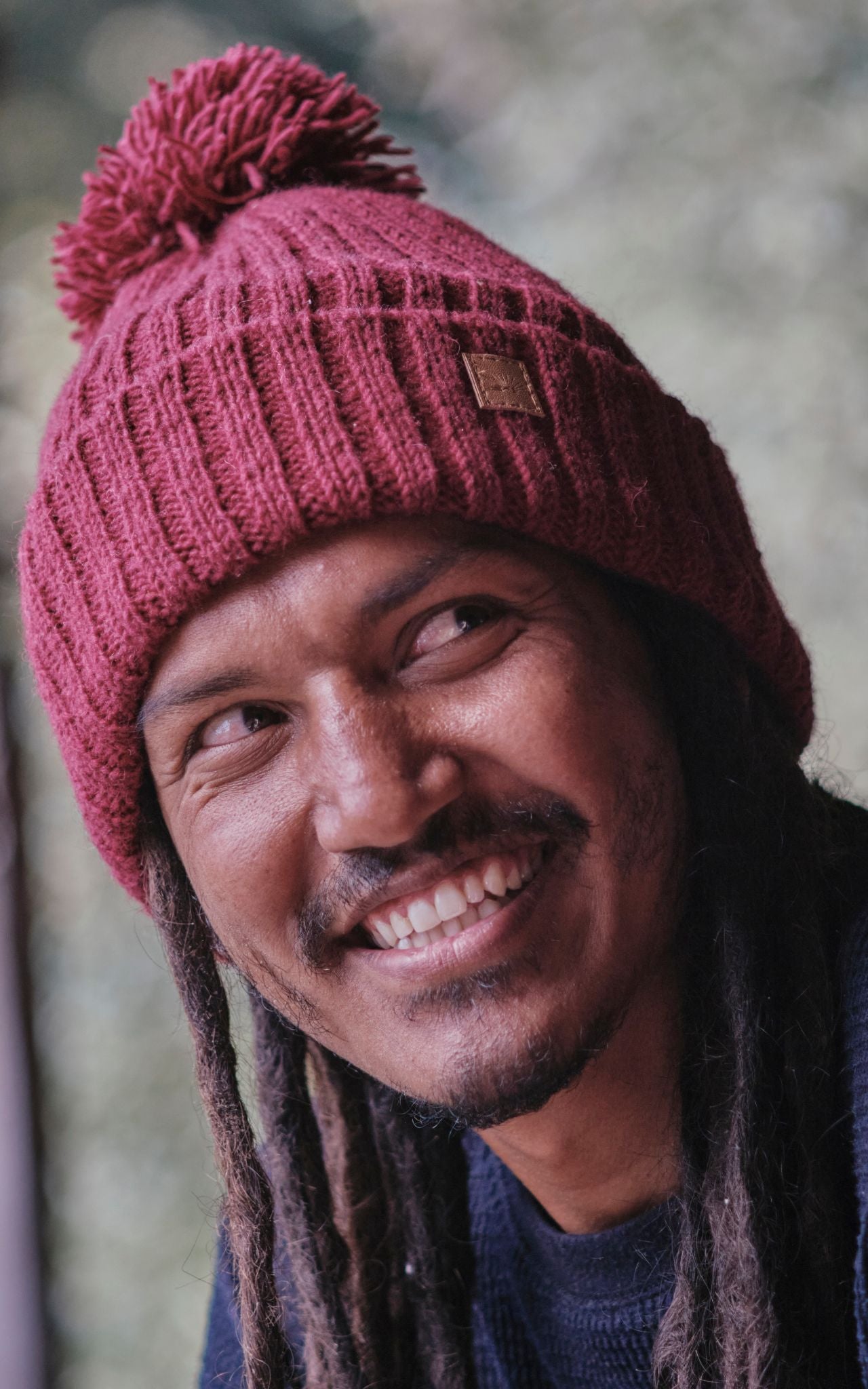 Surya Australia Ethical Wool Pompom Beanie for Men from Nepal - Maroon