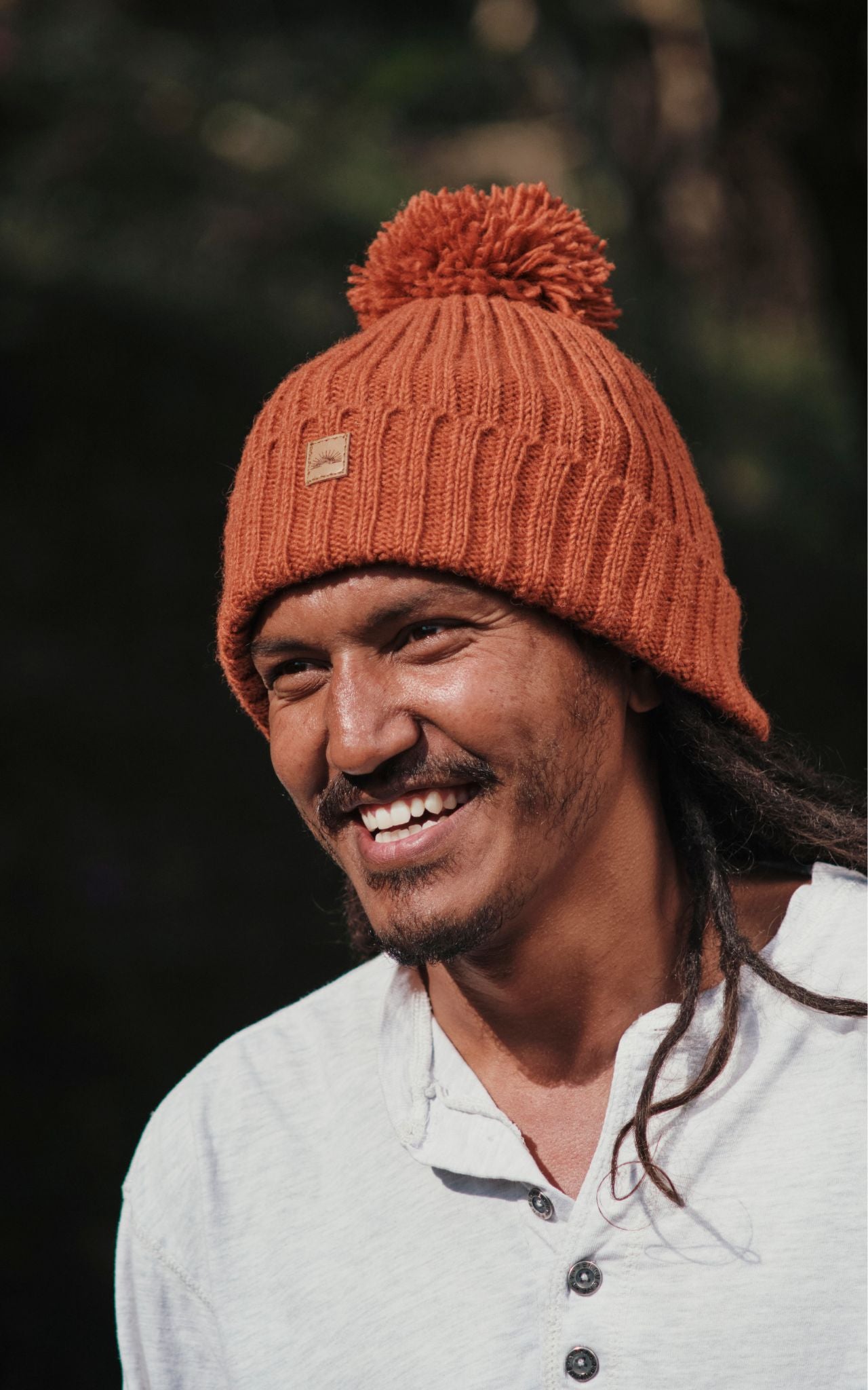 Surya Australia Ethical Wool Pompom Beanie for Men from Nepal - Burnt Orange
