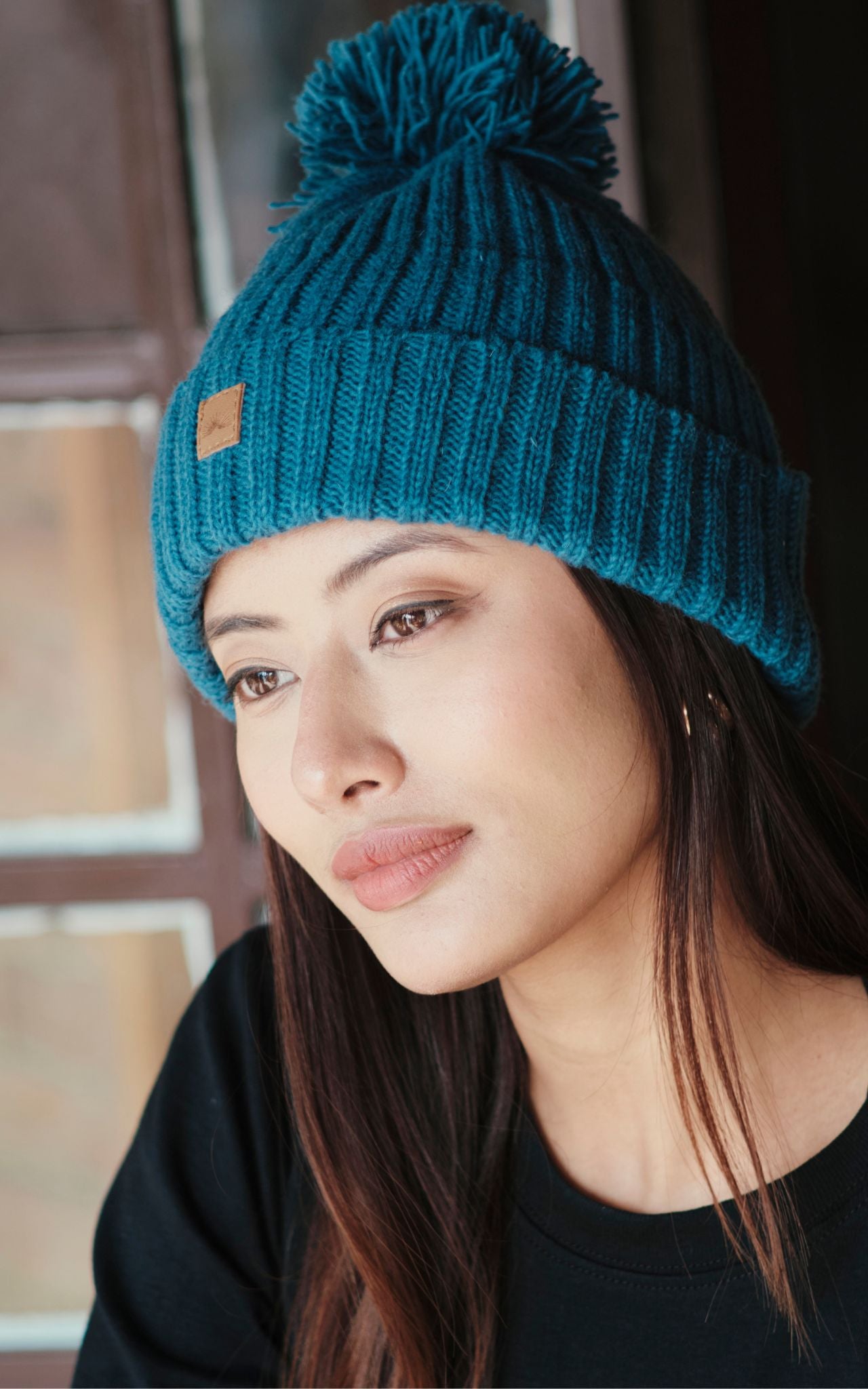 Surya Australia Wool 'Pompom' Beanie for women made in Nepal  - Cobalt