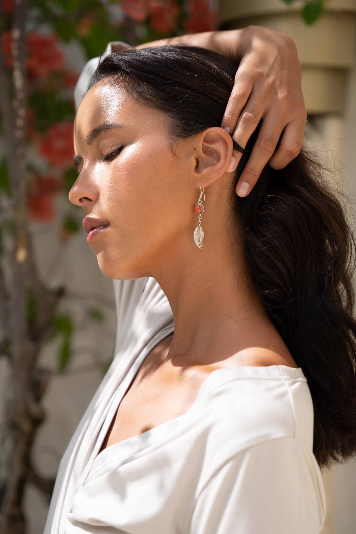 Surya Tibetan style leaf earrings made in Nepal - on location in Bali