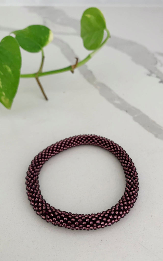 Surya Australia Ethical Roll-on Beaded Bracelet from Nepal - Maroon