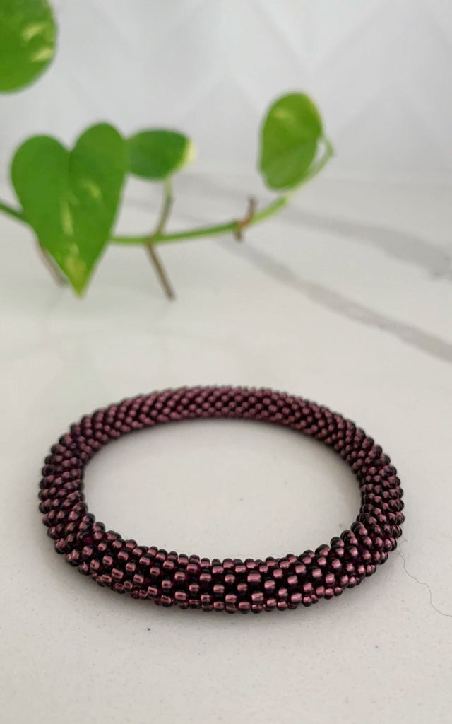 Surya Australia Ethical Roll-on Beaded Bracelet from Nepal - Maroon