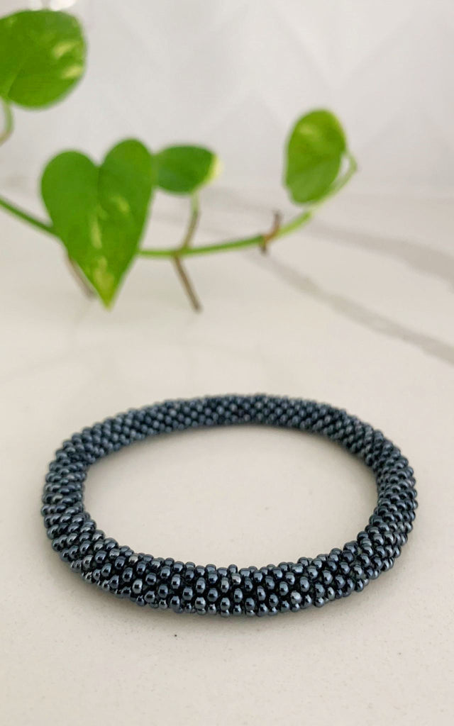 Surya Australia Ethical Roll-on Beaded Bracelet from Nepal - Steel Grey
