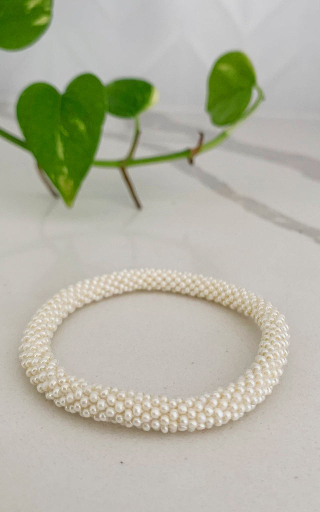 Surya Australia Ethical Roll-on Beaded Bracelet from Nepal - White