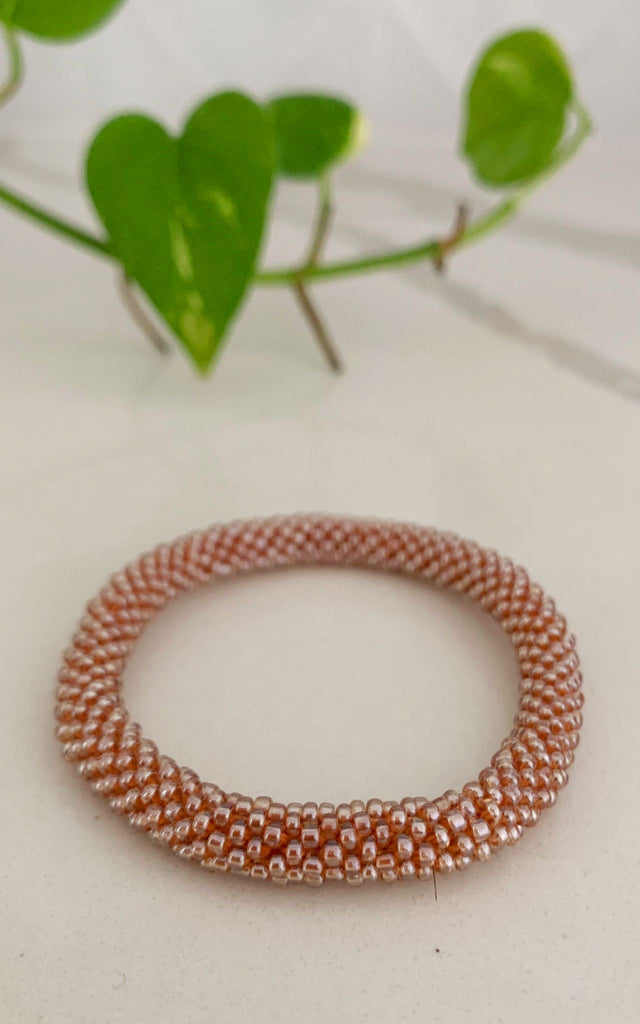 Surya Australia Ethical Roll-on Beaded Bracelet from Nepal - Gold