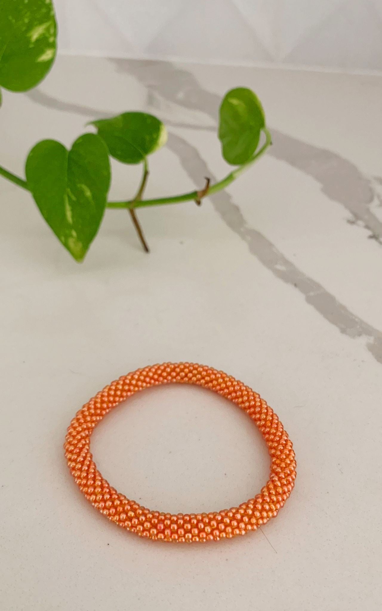 Surya Australia Ethical Roll-on Beaded Bracelet from Nepal - Orange