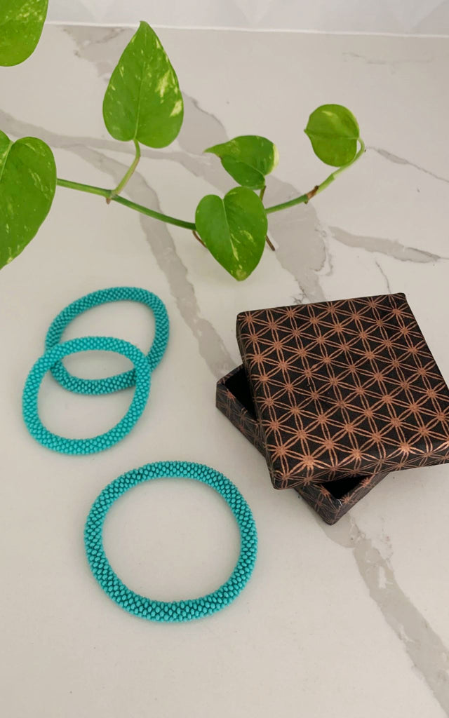 Our trio pack is presented in a beautiful handmade Lokta paper boxSurya Australia Ethical Glass Bead Roll-on Bracelets made in Nepal - Aqua
