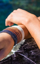 Surya Australia Ethical Roll-on Beaded Bracelet from Nepal - Rust